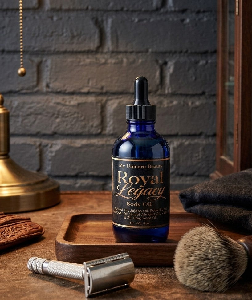 Blue bottle of 'Royal Legacy' body oil on a wooden tray with a razor and brush against a brick wall background.