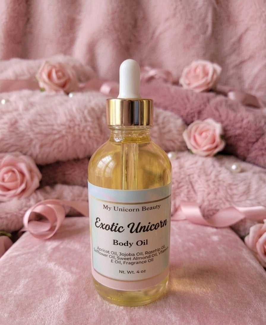 Bottle of 'My Unicorn Beauty Exotic Unicorn Body Oil' with a dropper on a pink floral background.