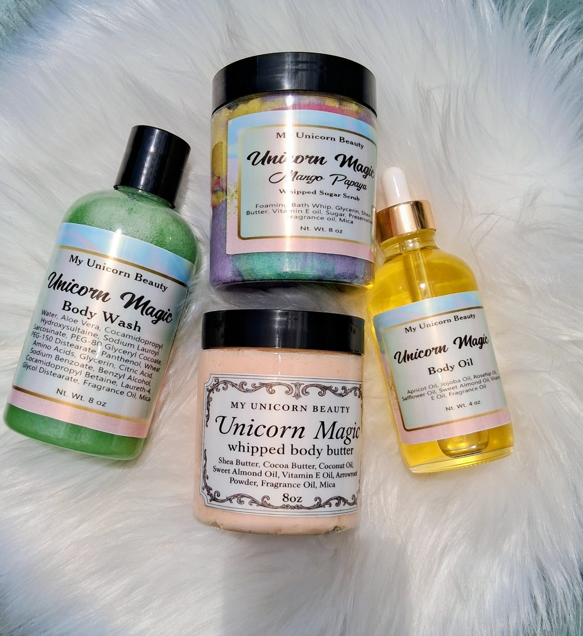 Collection of 'My Unicorn Beauty' skincare products on a fluffy white surface