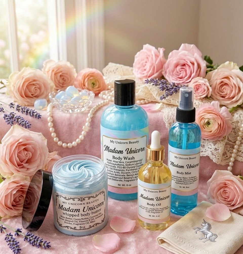 Collection of Madam Unicorn beauty products with flowers and a rainbow in the background