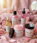 Collection of Unicorn Diva beauty products on a pink background with roses.