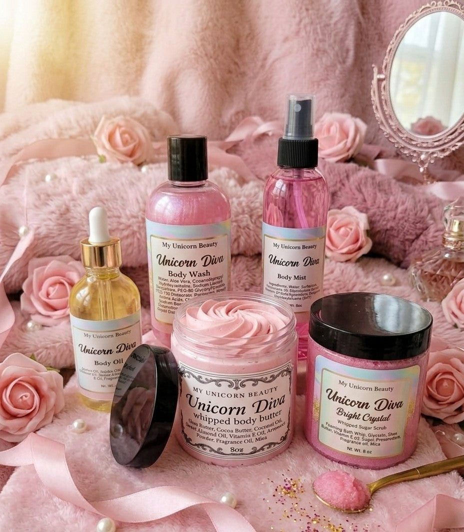 Collection of Unicorn Diva beauty products on a pink background with roses.