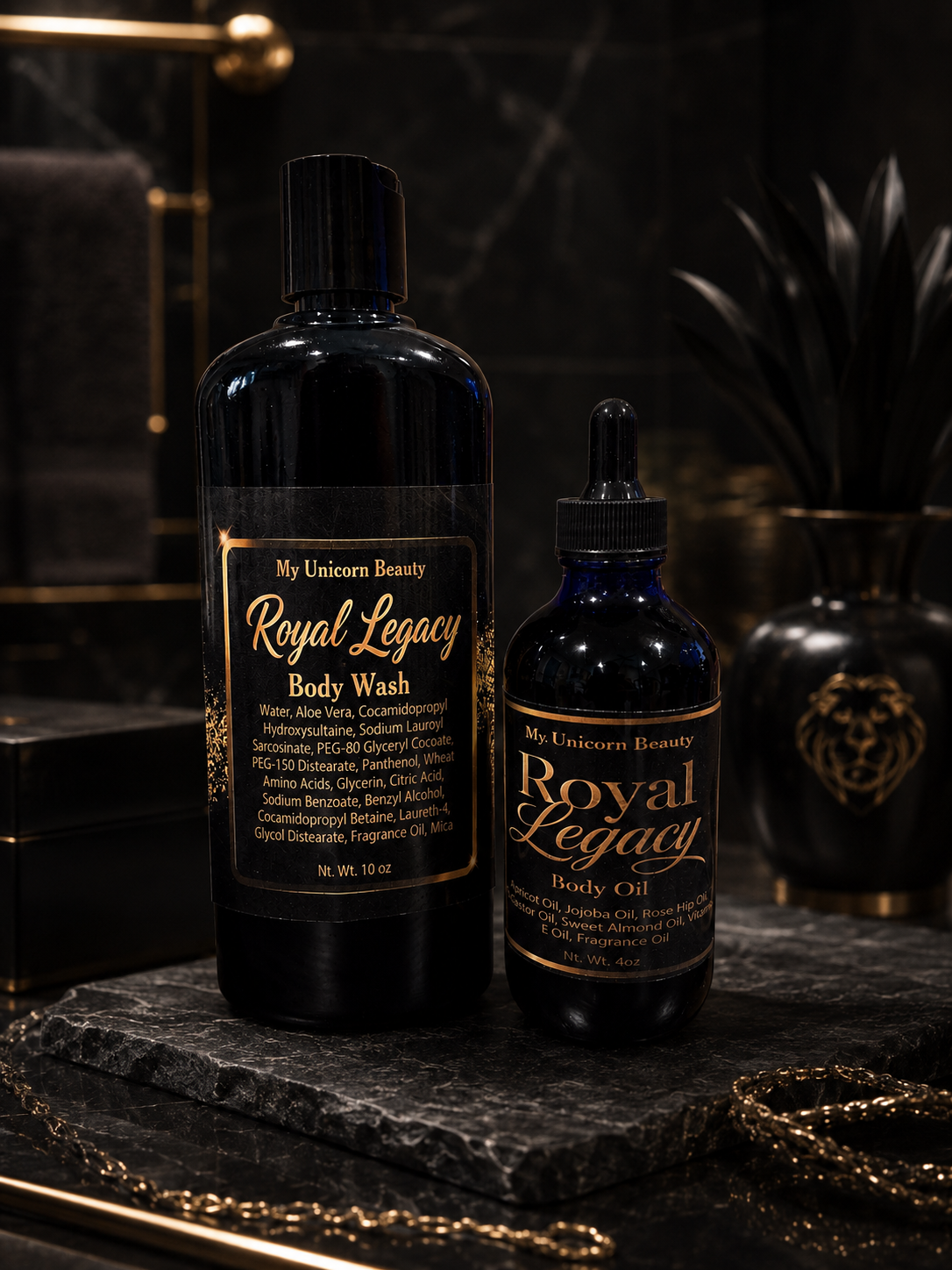 Two bottles of 'My Unicorn Beauty Royal Legacy' body wash and body oil on a dark surface with decorative elements.