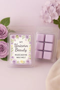 Wax melt packaging with floral design and text on a light pink background with flowers.